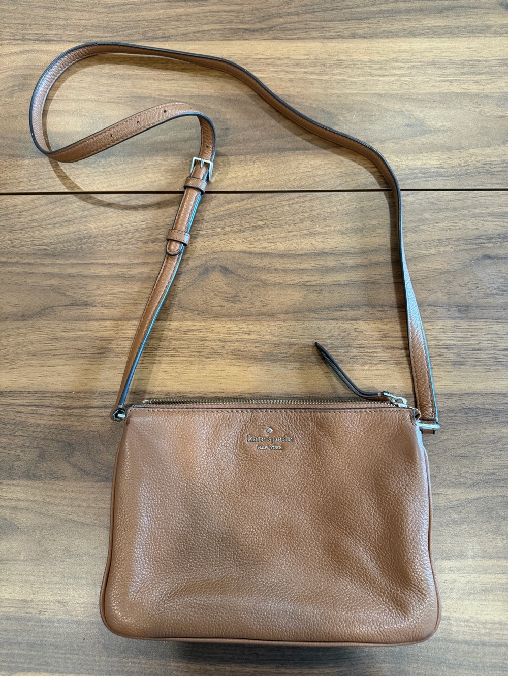 kate spade tan pebbled leather crossbody with gold logo